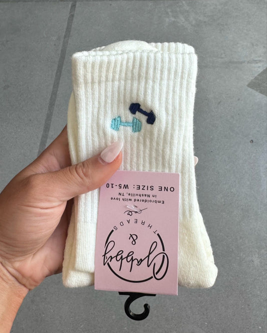 White socks with embroidered blue barebells