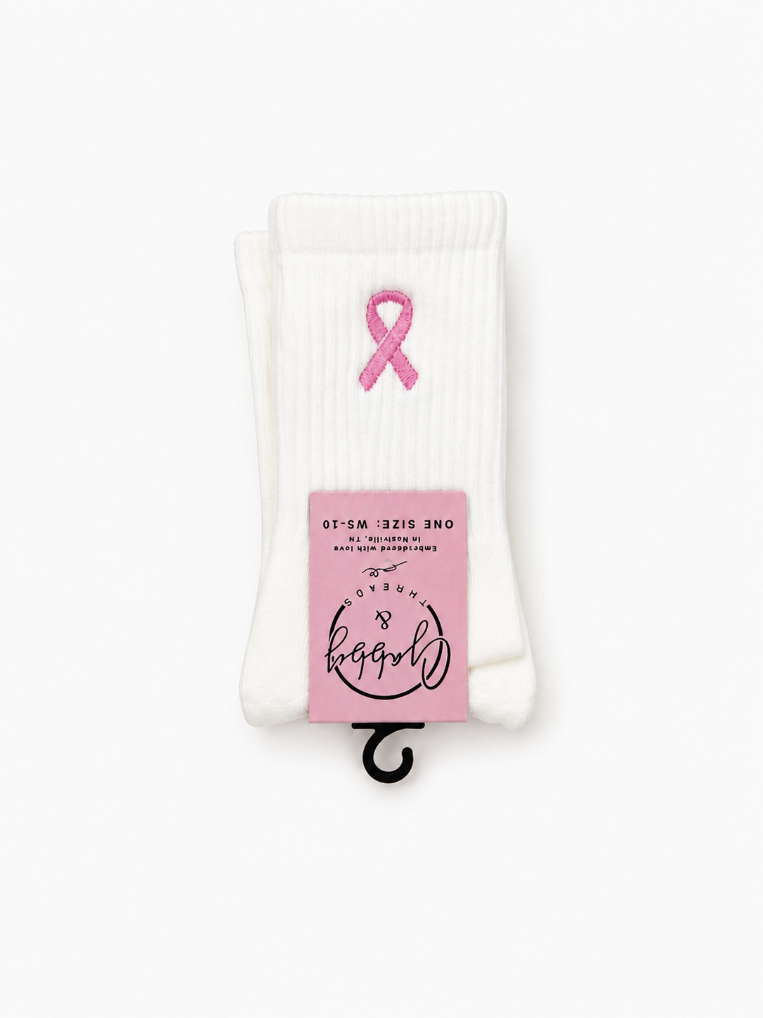 a pair of white socks with a pink breast cancer ribbon embroidered on it 