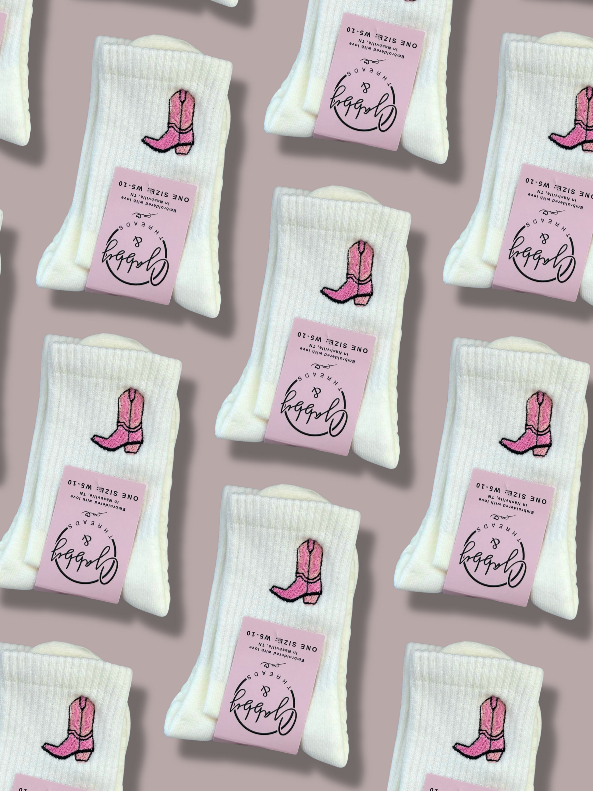 White socks with pink cowboy boot embroidery