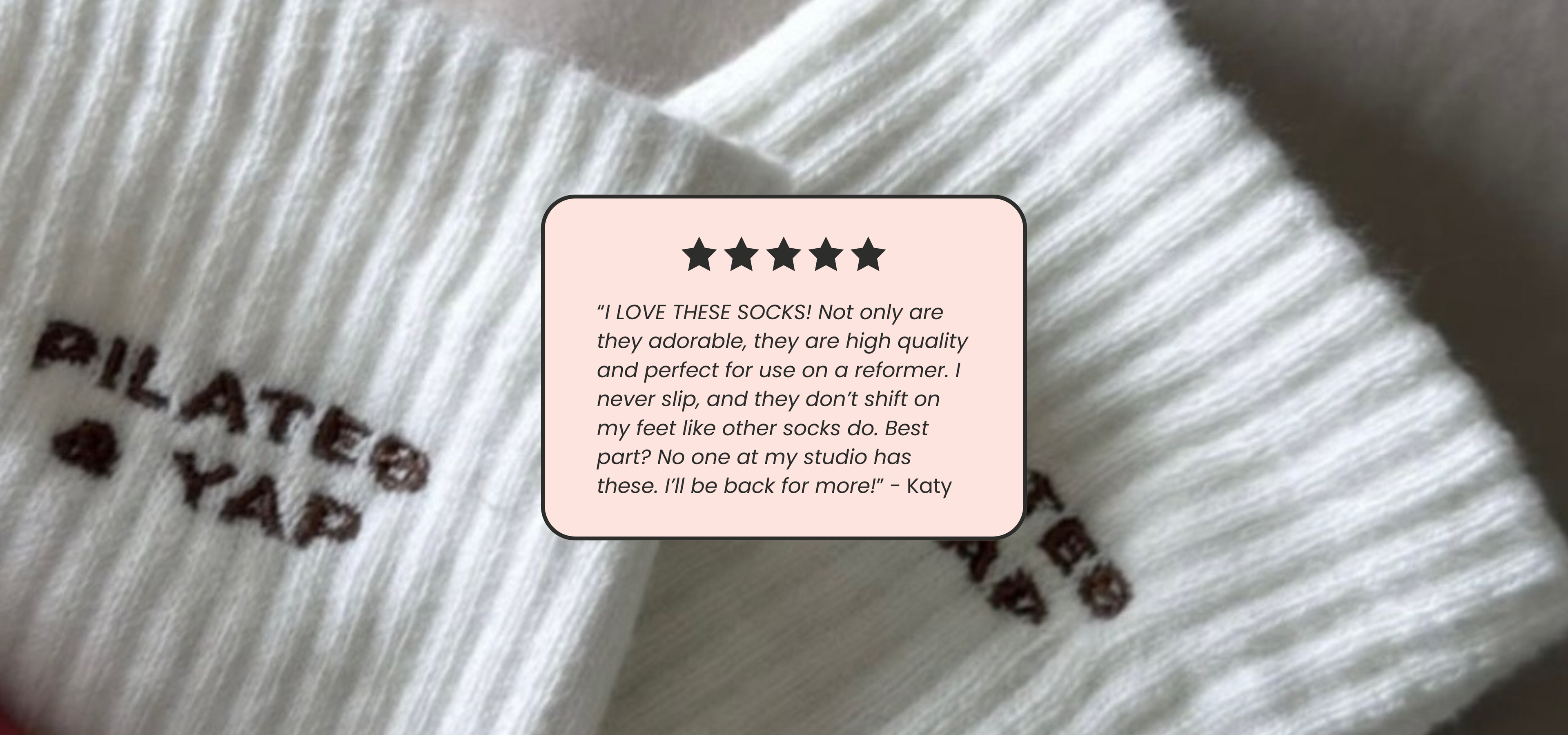 White sock with black text and a five-star review card on top