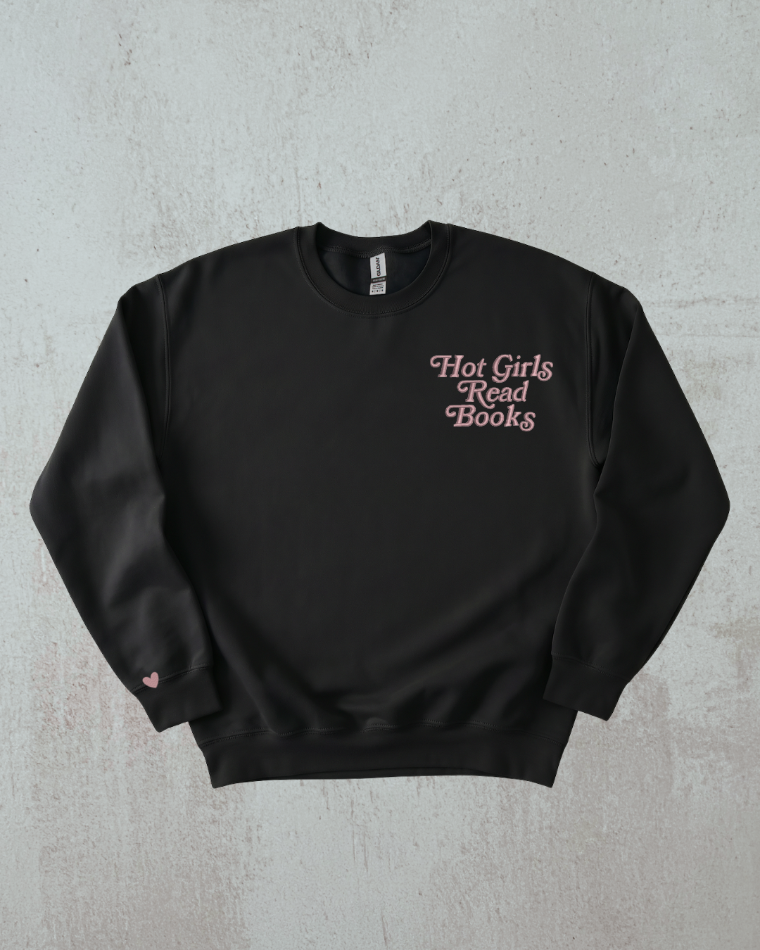 Black sweatshirt with 'Hot Girls Read Books' text on a gray background