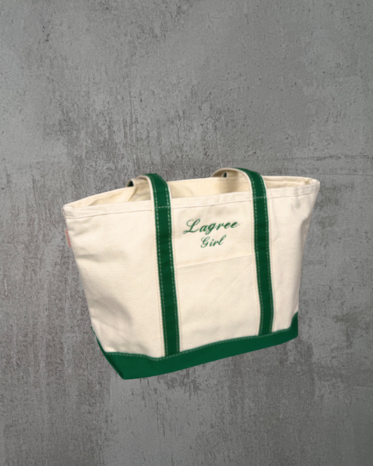 White tote bag with green trim and 'Lagree Girl' text on a gray background