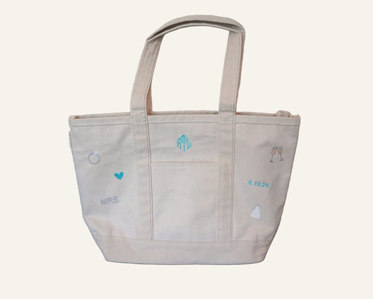 Natural canvas tote bag with embroidered bridal designs