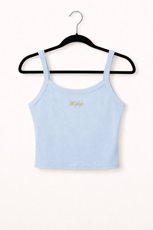Light blue tank top with a brand logo on a black hanger against a white background
